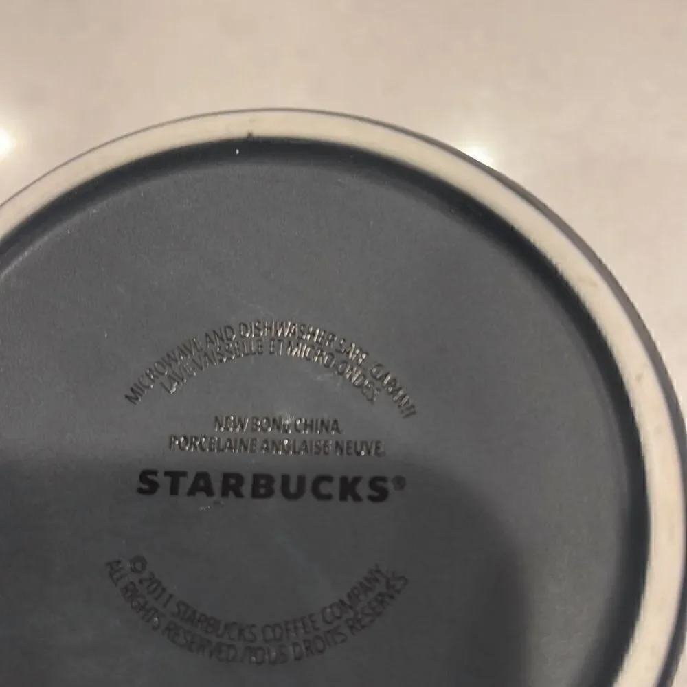 Starbucks French roast new bone china 2011 coffee cup brown on inside, nice feel